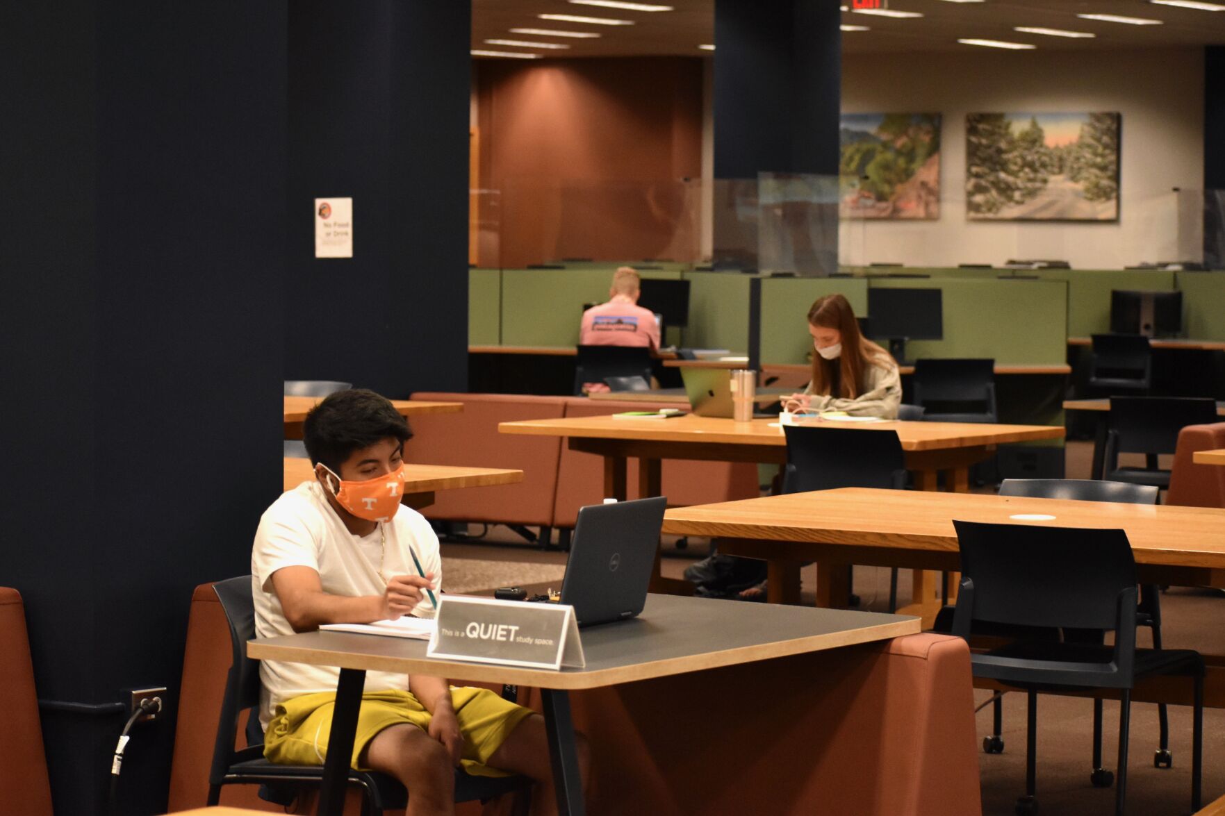 Students studying (with masks) - staff report